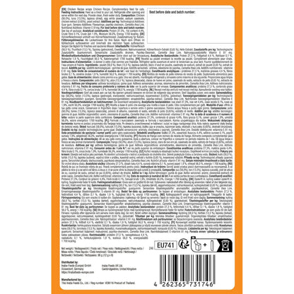 Dorso de la caja naranja con el etiquetado legal en varios idiomas y el código de barras