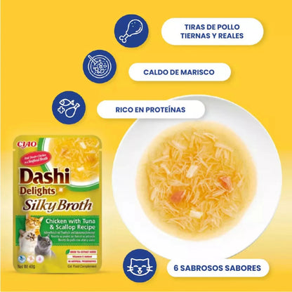 Bolsa de Dashi Delights de atún y vieira junto a un plato de caldo con tiras de pollo
