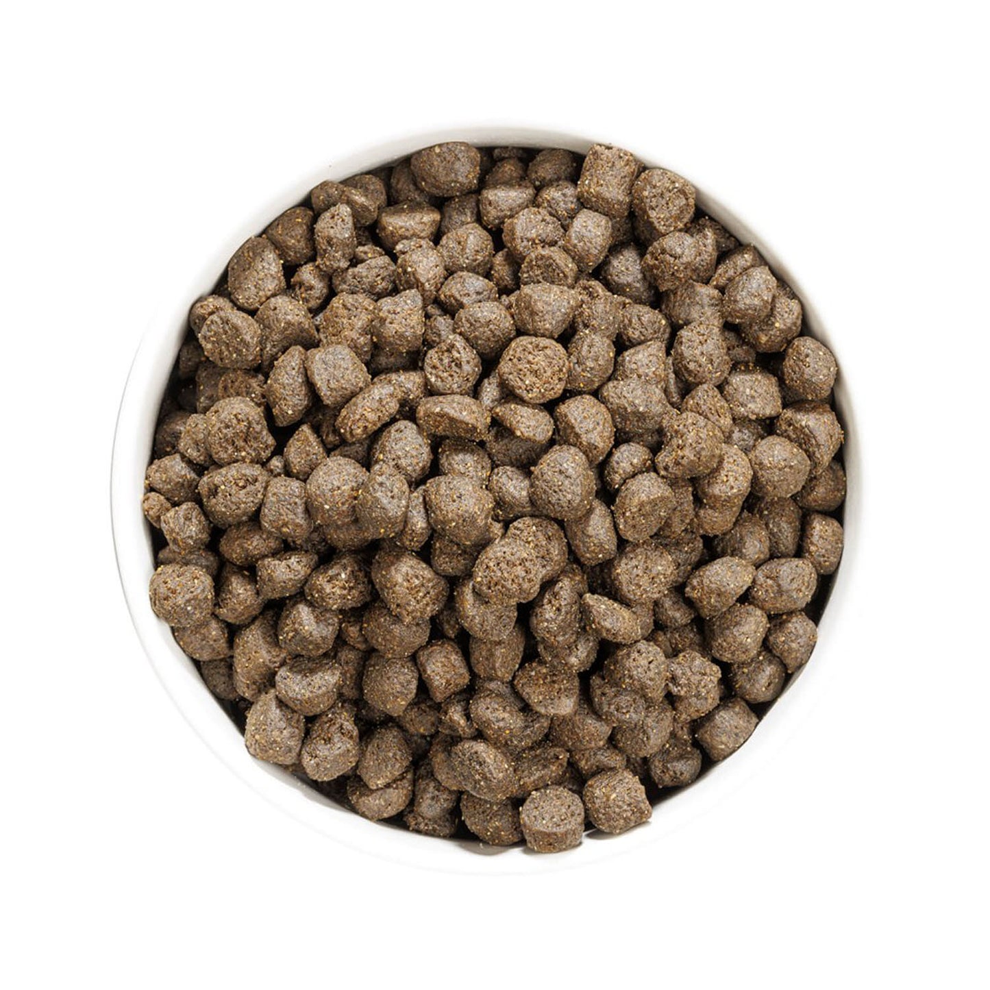 Vista superior de un cuenco lleno de croquetas del pienso Ownat Grain Free Prime Oil Fish, alimento seco natural que favorece la digestión y aporta nutrientes esenciales para el óptimo desarrollo de perros adultos.