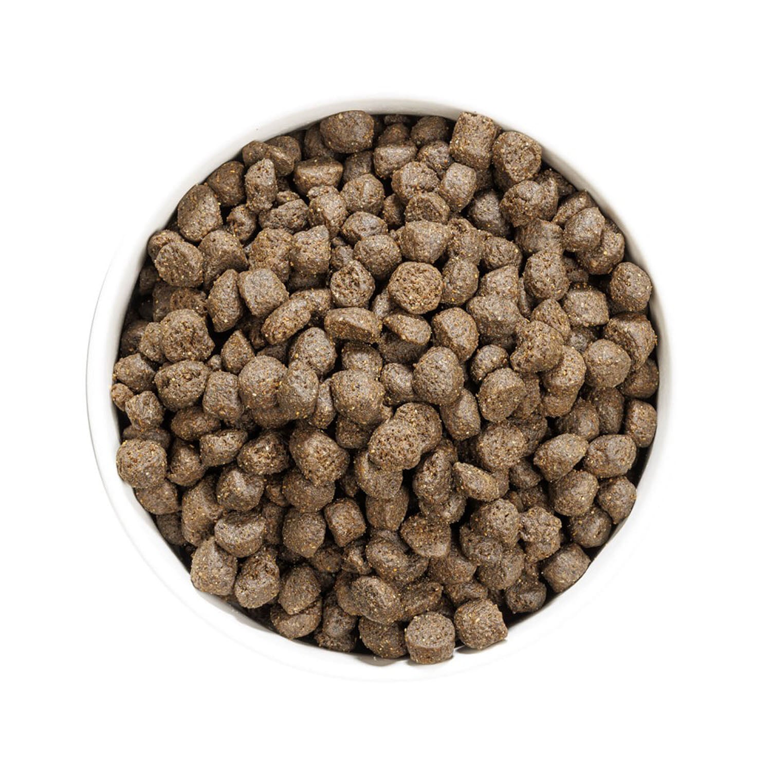 Vista superior de un cuenco lleno de croquetas del pienso Ownat Grain Free Prime Oil Fish, alimento seco natural que favorece la digestión y aporta nutrientes esenciales para el óptimo desarrollo de perros adultos.