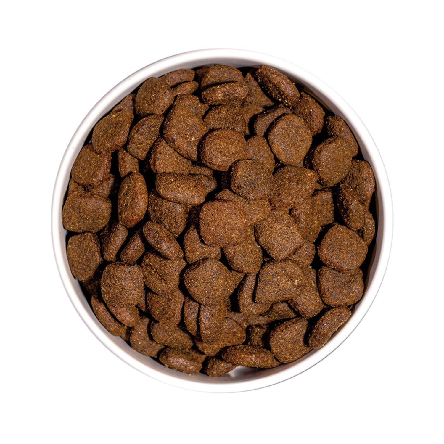 Vista superior de un cuenco lleno de croquetas del pienso Ownat Grain Free Prime Senior Chicken & Turkey, alimento seco natural que favorece la digestión y aporta nutrientes esenciales para el óptimo desarrollo de perros senior.